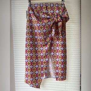 Stylish Babaton mock wrap skirt. Size 2, vibrant, lightweight & breezy.